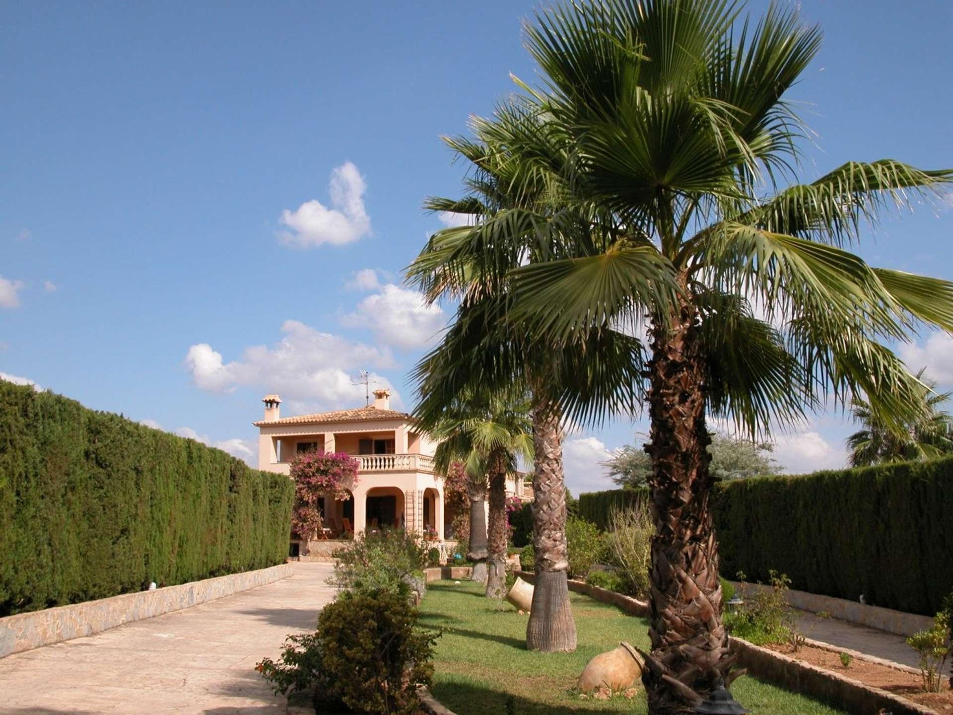 Villa con jardín