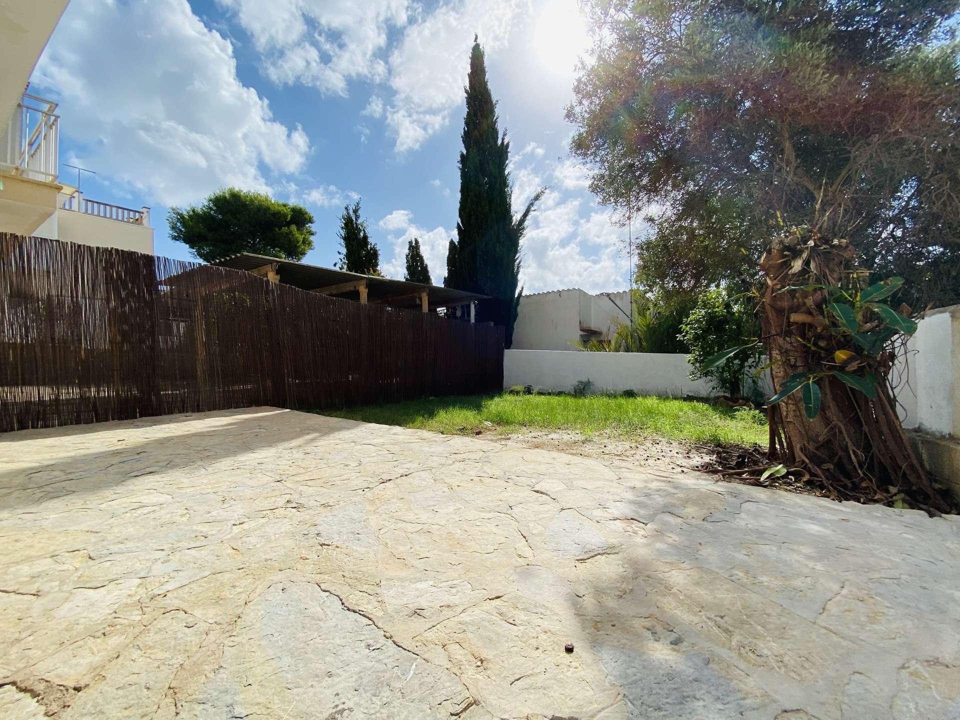 Terraza con jardín